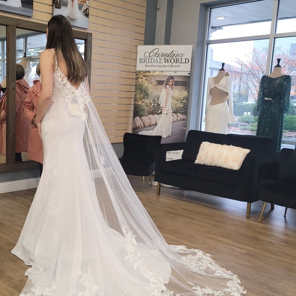 Elegant White Bridal Gown with Lace Details